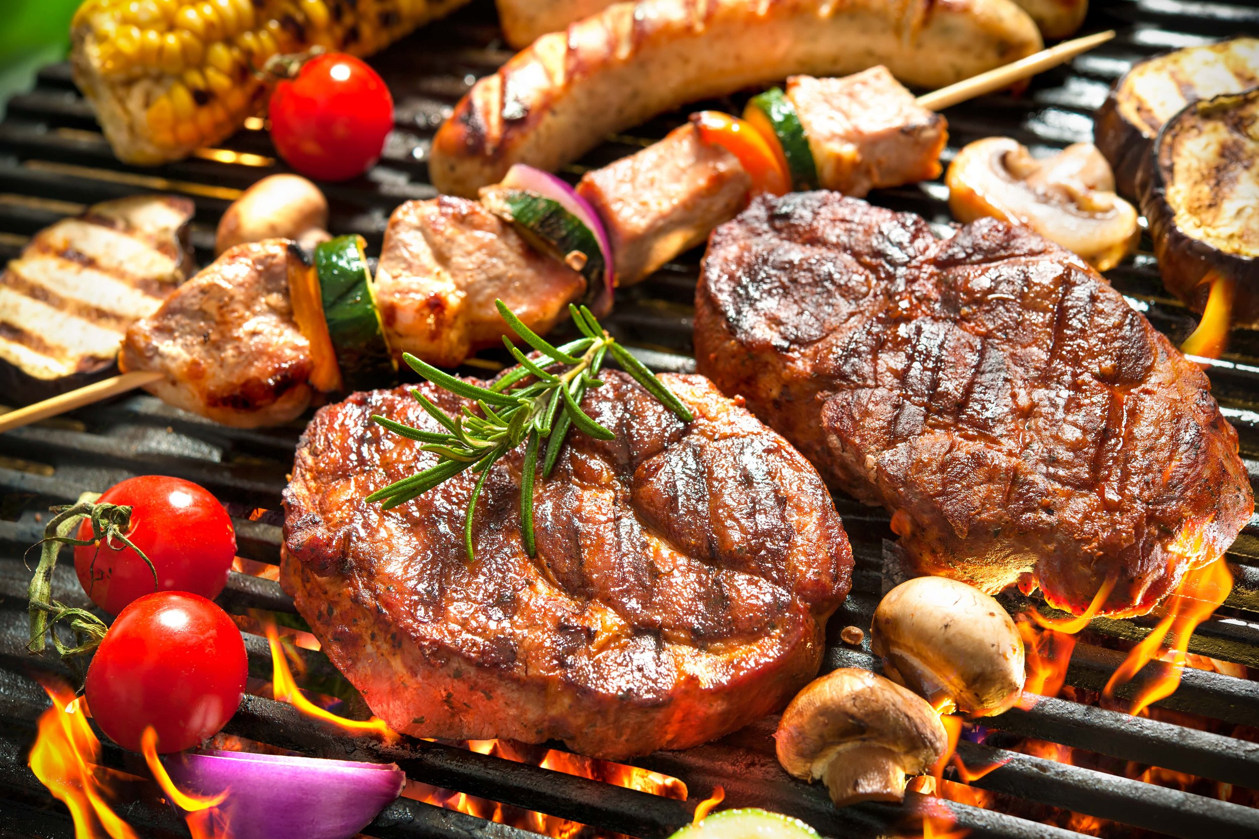 Perfect steak on a grill with vegetables